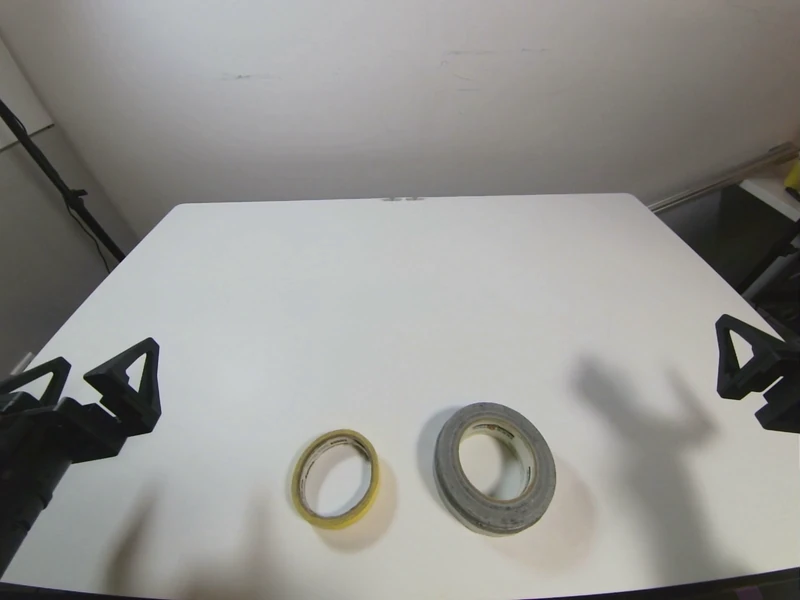Original left stereo image showing yellow and grey tape